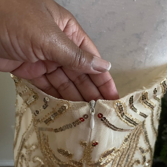 Cream halter dress with gold sequin accents. - Picture 2 of 5